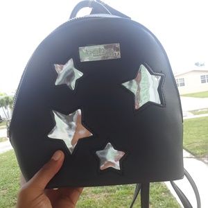 Bebe Los Angeles Backpack and Levis shoes